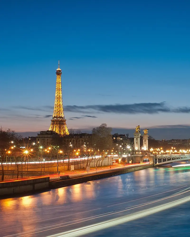 The Eiffel Tower and Pont Alexandre III at night