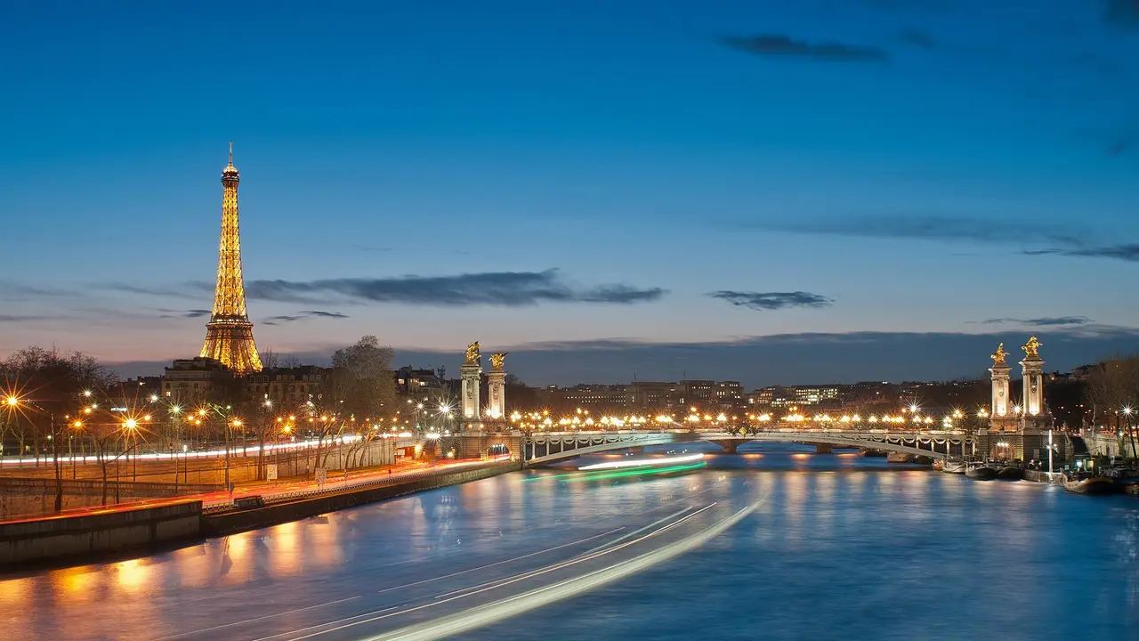 The Eiffel Tower and Pont Alexandre III at night